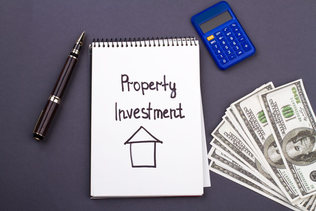 Property and investment concept. Flat lay real estate. Calculating finance and accounting concept.