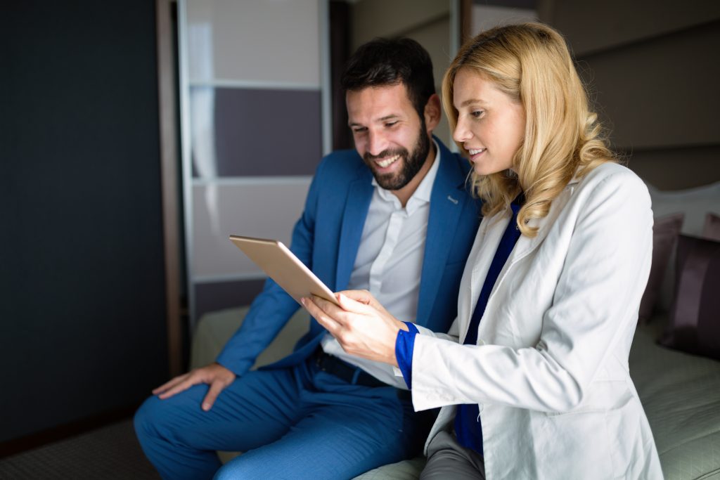 Businesspeople on business trip staying in hotel together