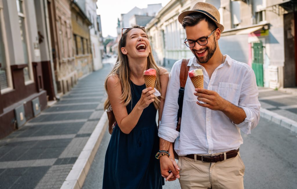 Portrait of happy young couple having date and fun on vacation. People travel happiness concept.