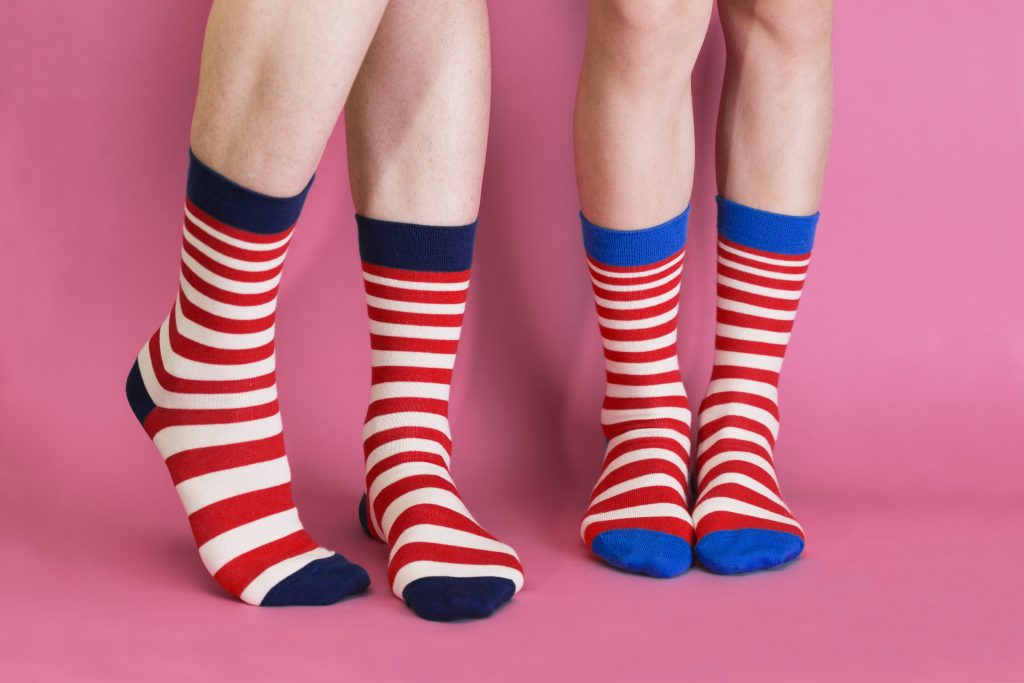 striped bright socks on a pink background